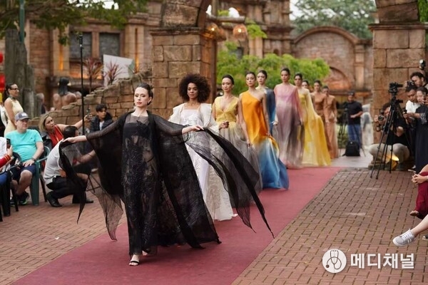 Chinese costume fashion show during the exhibition